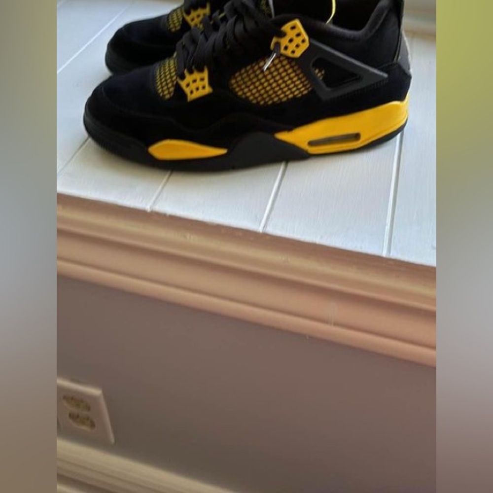 Air Jordan 4s Thunders (yellow & black)